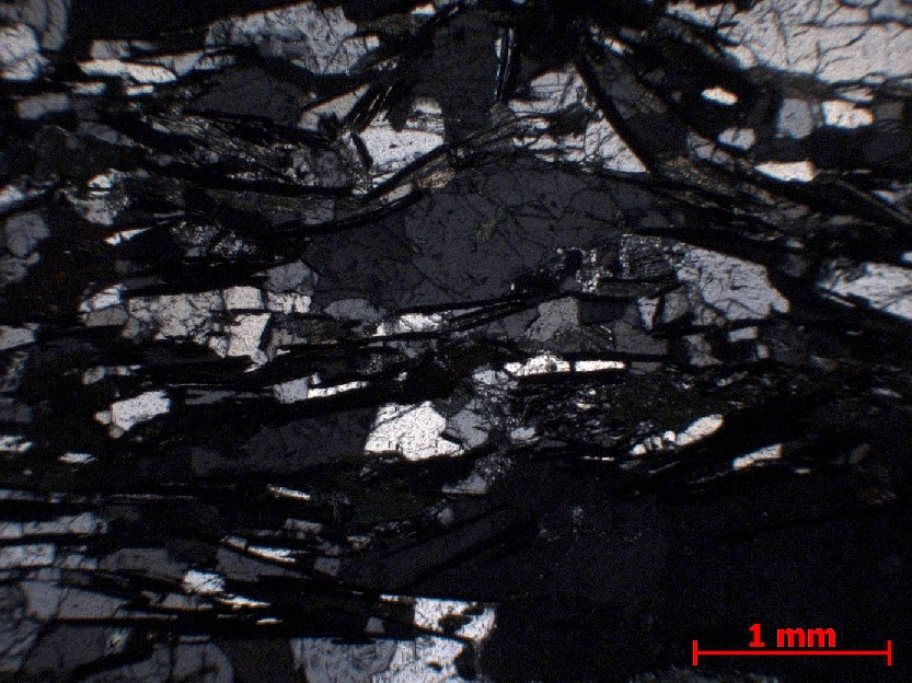  Microscope Gneiss à graphite Gneiss à graphite   Andasibe (Perinet) Exploitation de graphite Izouard